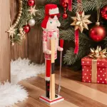 Casse - noisette en bois (h60 cm) henri en ski rouge et blanc