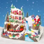 Village de no�l lumineux et musical p�re no�l en montagne