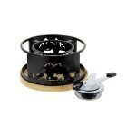 R�chaud � fondue noir en fer ? motifs vaches d�coup�s au laser ? plateau en bois ? br�leur � p�te � combustibl ...