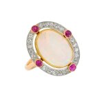 Bague vintage opale, rubis 0. 25 carat et diamants 0. 50 carat 2 ors 7. 85g Bague vintage opale, rubis 0. 25 carat et diamants 0. 50 carat 2 ors 7. 85g
