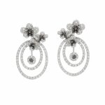 Boucles d'oreilles diamants noirs et blanc 0. 92 carat or blanc 7. 04g