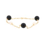 Bracelet perles et onyx or jaune 3. 84g