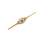 Broche saphir 0. 35 carat et diamants en or jaune