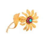 Broche vintage fleur rubis de synthèse 0. 12 carat or jaune 10. 59g Broche vintage fleur rubis de synthèse 0. 12 carat or jaune 10. 59g
