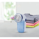 Rasoir anti - peluches, avec r�servoir et brosse
