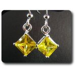 Boucles d'oreille topaze jaune 2x5 mm plaqué or blanc 18 k. Boucles d'oreille topaze jaune 2x5 mm plaqué or blanc 18 k.