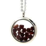Collier grenat brut. modle mdaillon 20 mm. couleur argent.