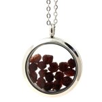 Collier grenat brut. modle mdaillon 30 mm. couleur argent.