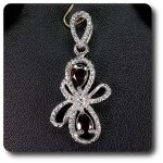 Pendentif grenat argent 925 + plaqu� or blanc 14 k.