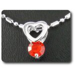 Pendentif rubis 5 mm plaqu or blanc 18 k.