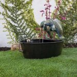 Toucan de jardin cascade fontaine dcoration rsine artisanat scne d'eau qui verticalement maison extrieur ...