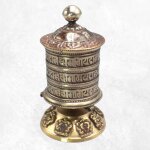 Moulin à prière bouddhiste socle signes auspicieux 13 cm Moulin à prière bouddhiste socle signes auspicieux 13 cm