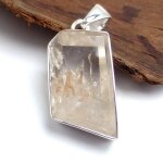 Pendentif asymtrique en cristal quartz manifestation
