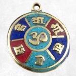 Pendentif tibtain mdaillon om ou kalachakra avec om tibtain