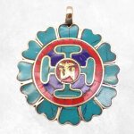Pendentif tibtain symboles bouddhistes avec om indien