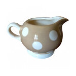 Cr�mier beige � pois blancs d�jeuner sur l'herbe