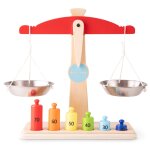 Balance avec poids rouge