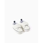 Baskets en similicuir blanc