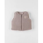 Bodywarmer en sherpa beige