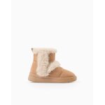 Bottes avec fausse fourrure beige