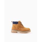 Bottes de montagne avec des lacets et fermeture clair beige fonc