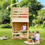 Cabane tour en bois avec comptoir et bac � sable shopping marron