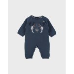 Combinaison bébé en tricot bleu Combinaison bébé en tricot bleu