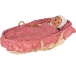Couffin avec linge de lit rouge Couffin avec linge de lit rouge