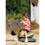 Pelleteuse super builder enti�rement articul�e avec assise ouvrante jaune
