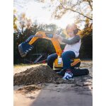 Pelleteuse super builder enti�rement articul�e avec assise ouvrante jaune rouge