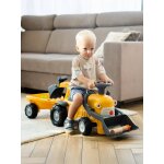 Porteur avec pelle frontale, excavatrice arri�re et remorque jaune