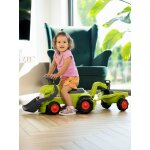 Porteur avec pelle frontale, excavatrice arri�re et remorque vert