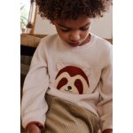 Pull b�b� en tricot gustin ecru