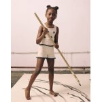 Top en maille avec fleurs au crochet blanc