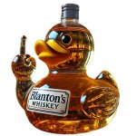 Bouteille de whisky amusante, statue en verre representant un teckel, un bouledogue, un canard, une carafe ...