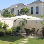 Ensemble parasol ecru 3x4m et 4 dalles a lester
