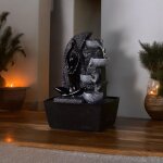 Fontaine cascade d�cor roche en r�sine et statuette yoga noire h25cm