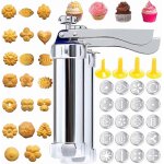 Machine a biscuits avec 20 disques et 4 douilles a p�tisserie pour la d�coration de g�teaux et de biscuits. ...