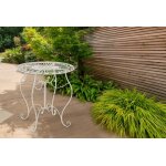 Table de jardin avec plateau rond en m�tal cr�me antique
