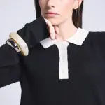 Pull col polo boutons noir et blanc en cachemire