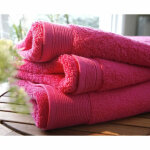 Serviette invit 30 / 50 micro - coton 600 grm unie - fuchsia