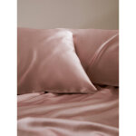 Taie d?oreiller simple enveloppée en soie rose poudrée Taie d?oreiller simple enveloppée en soie rose poudrée