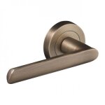 Poign�es sur rosaces rondes - laiton massif - vieux laiton - spartine dcg