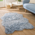 Tapis poils forme peau de b�te - blancheporte