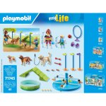 Aire de jeux pour chiens et personnages playmobil - la boite