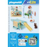 Enfant 2 cochons d'inde et accessoires playmobil - la boite