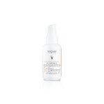 Fluide solaire anti - photovieillissement spf 50 + teint vichy laboratoires - le spray de 40ml