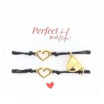 2 bracelets cordon noir c�urs aimantes inox or