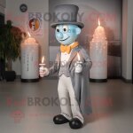 Bougie parfum�e argent�e mascotte redbrokoly personnage habill� d'un pantalon de costume et de b�rets ...