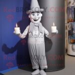 Bougie parfum�e argent�e mascotte redbrokoly personnage habill� d'un pantalon de costume et de b�rets ...